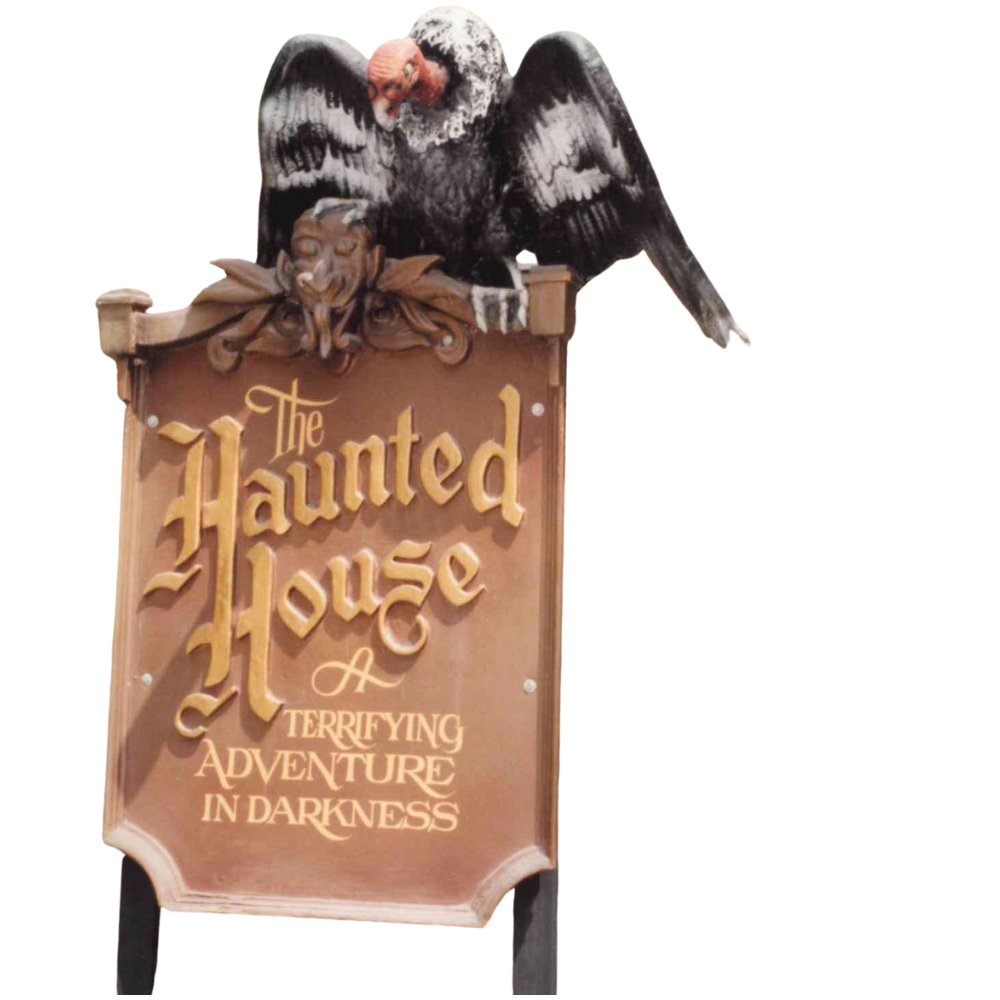 Vinne the vulture sitting on top of the Haunted House sign